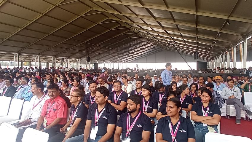 Guests await in anticipation for PM Modi to inaugurate the event